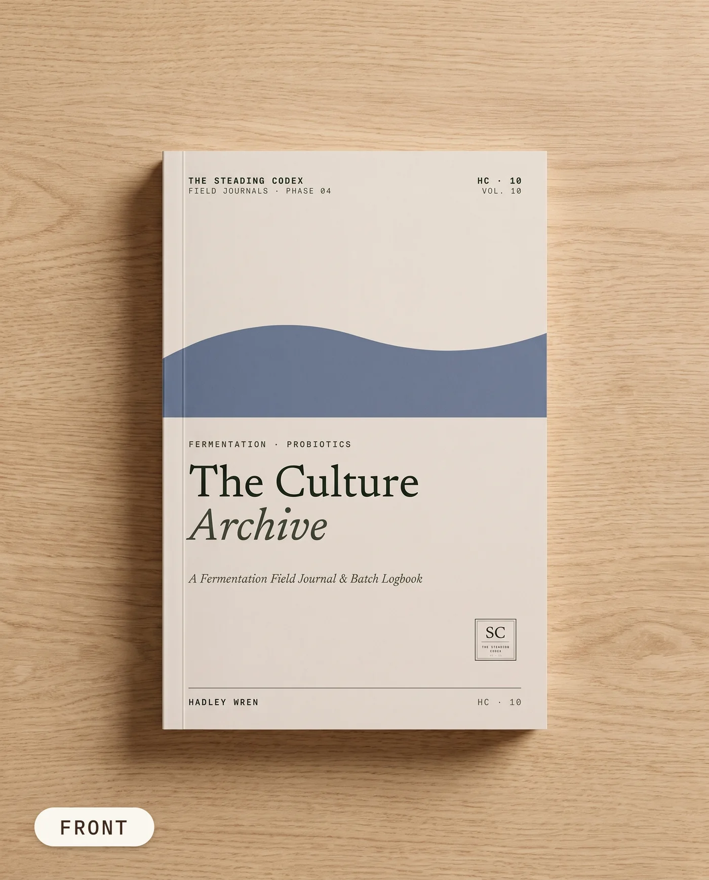 The Culture Archive fermentation journal — front cover on an oak table